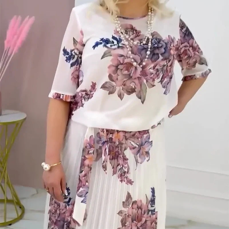 Abito da donna plissettato con motivo floreale
